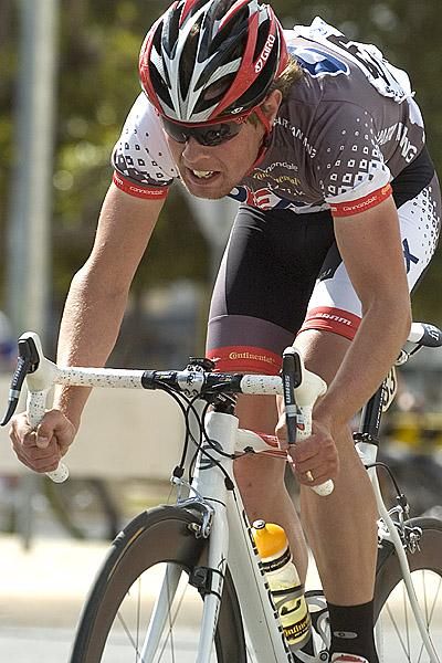 Tom Hanover (OEX-Team Enterprise) from New Zealand puts everything into it as he powers out of the round-about at the bottom end of the circuit.