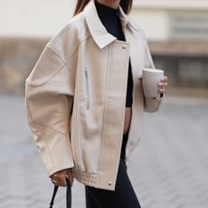 Does Matcha Cause Hair Loss Anna Winter is seen wearing black capri leggings in stretch cotton jersey from Skims; a black sleeveless high-neck crop top from Prada; an oversized cream-colored Enora faux leather jacket with wide sleeves, pointed collar and front zip closure from The Frankie Shop; a black Nappa leather pocket shoulder bag with multiple pockets, embossed lettering logo and gold-tone hardware from Miu Miu; a pair of black leather heeled sandals with an open square-shaped toe, slingback strap, asymmetric sides and a medium high block heel from Billi Bi; oversized aviator sunglasses with purple shaded lenses and a black acetate frame from Tom Ford; her brown hair is worn loose and straight on August 22, 2025 in Munich, Germany