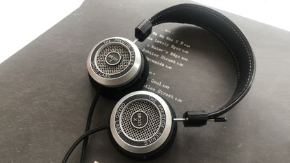 Grado SR325X headphones in open bookl