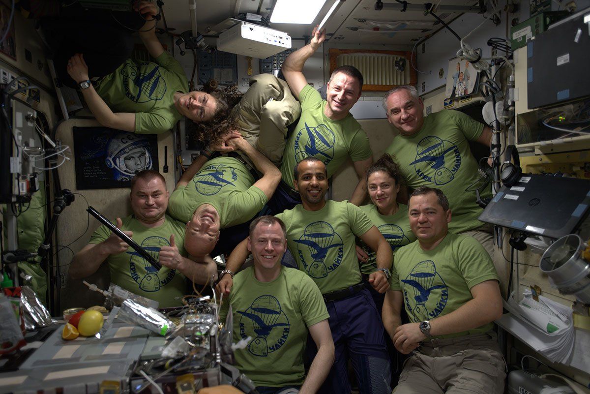 crowded-space-station-there-are-9-people-from-4-different-space