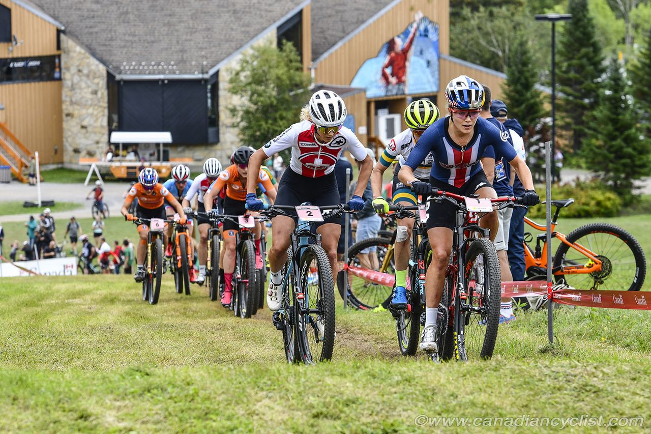 Kate Courtney (USA) leading Jolanda Neff (Switzerland) and Rebecca Mcconnell (Australia) on lap 1