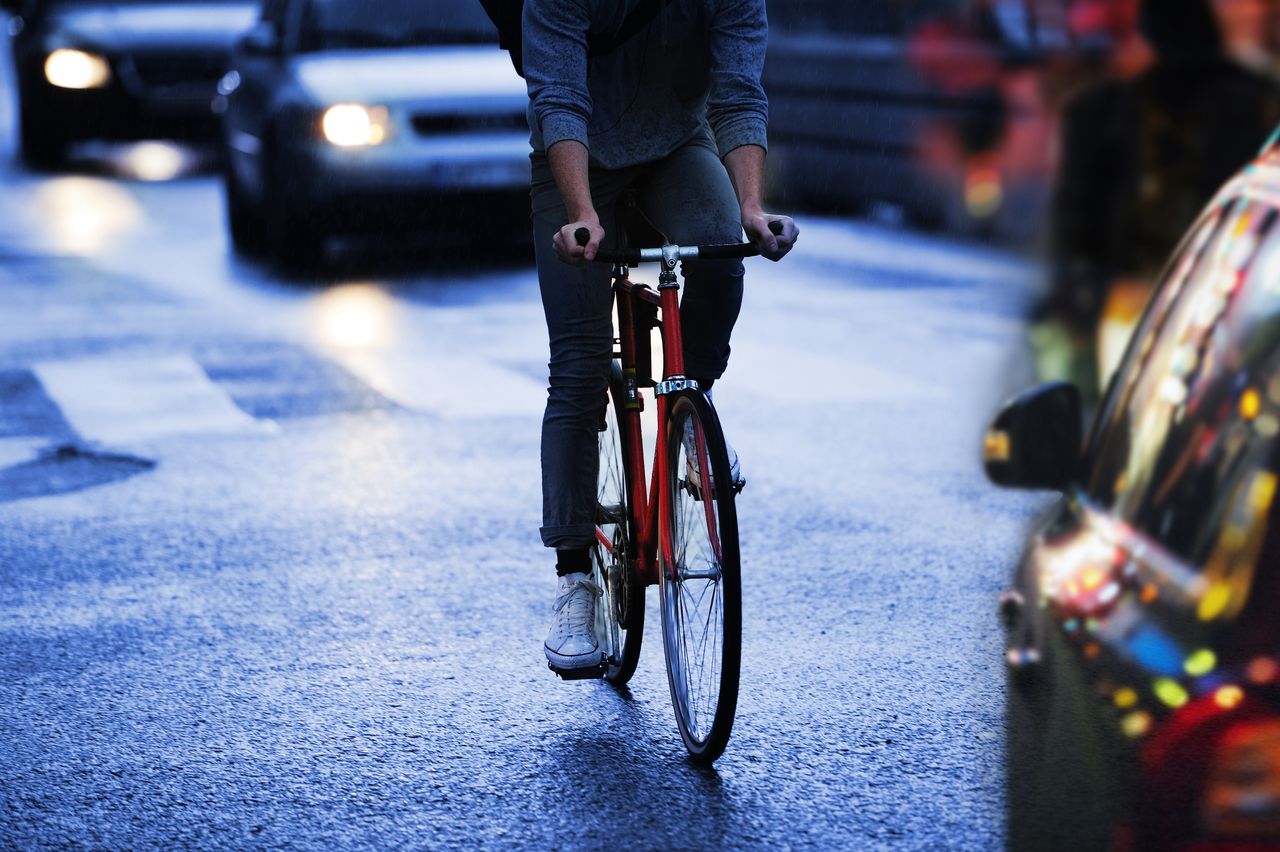 Cyclist with car