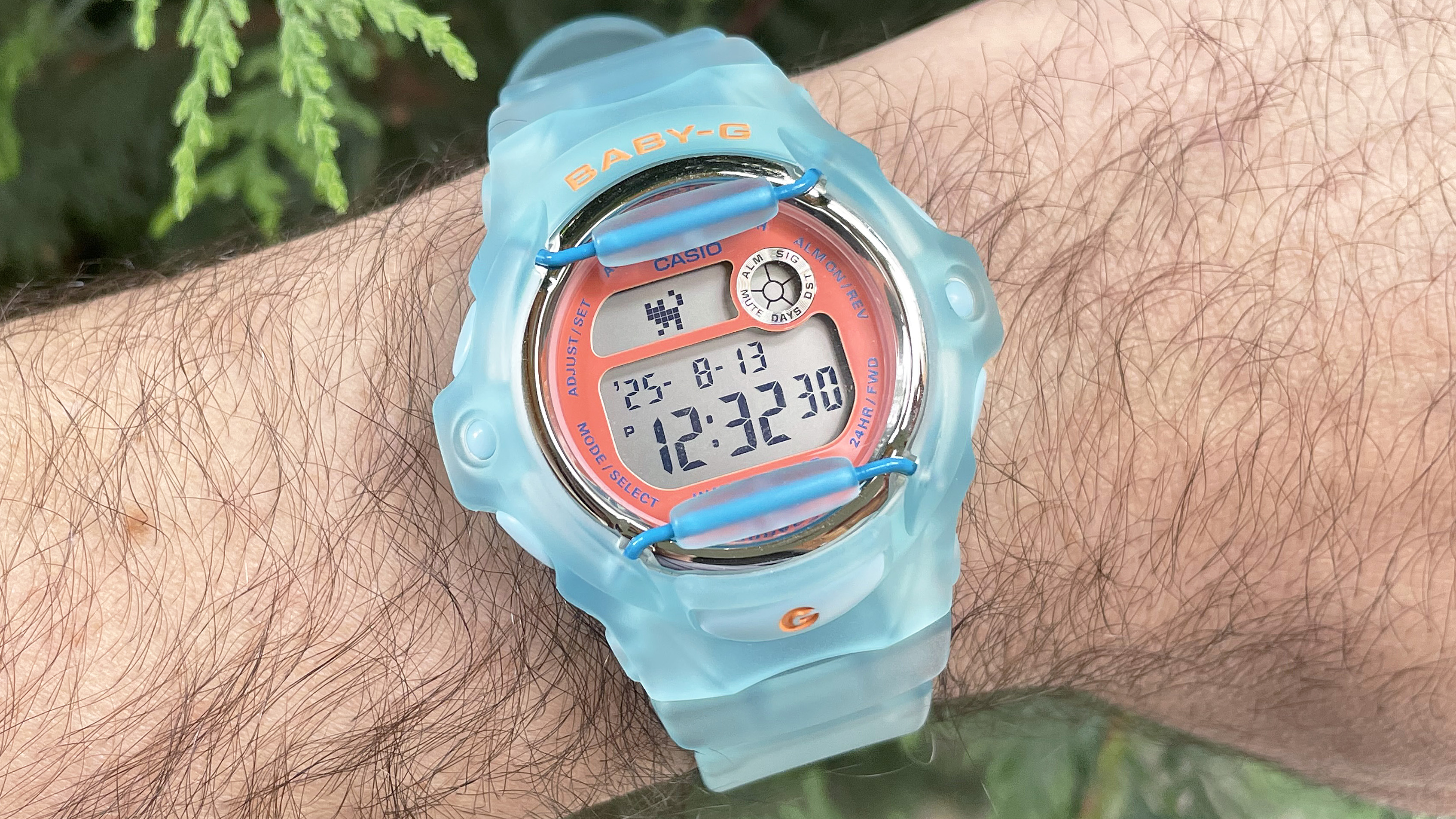 Close-up of the Casio Baby-G BG169 is semitransparent baby blue on the writer&#039;s wrist