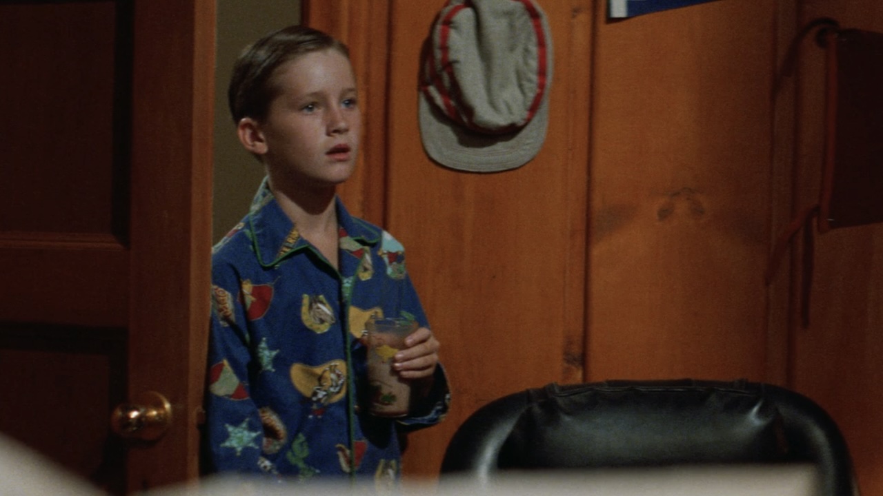 scotty in his pajamas with chocolate milk in The Sandlot