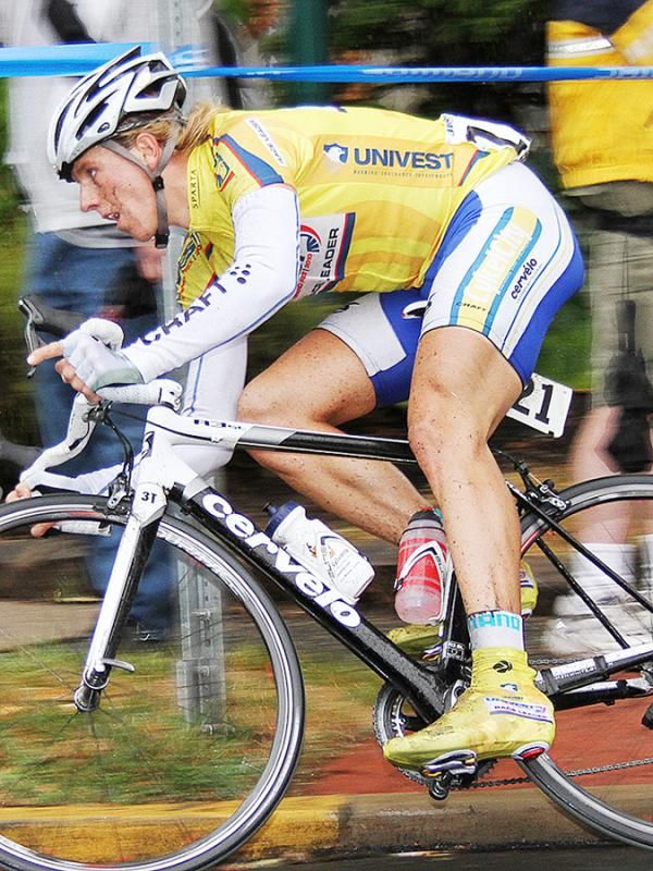 Even the yellow Jersey takes careful precautions on the sharp turns.