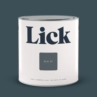 dark blue background with pot of paint in white tin from Lick