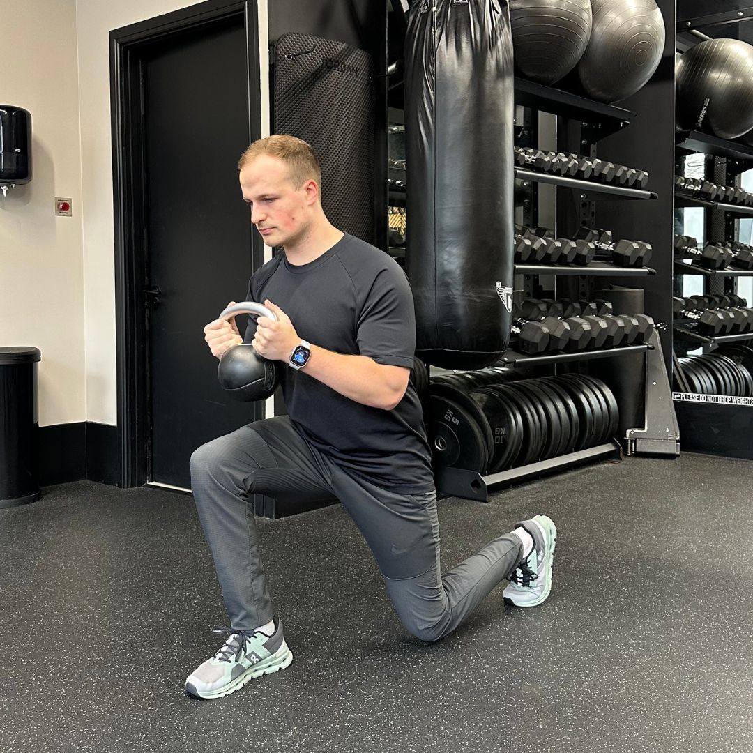 Personal trainer Ollie Thompson demonstrating a three-way lunge