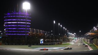 General shot of the track at the Bahrain International Circuit during the 2021 Bahrain International Circuit, showing Max Verstappen ahead of Lewis Hamilton.