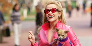 Reese Witherspoon carries Bruiser the dog on campus in Legally Blonde.