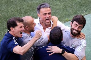 Luis Enrique celebrates victory against Croatia with his backroom staff