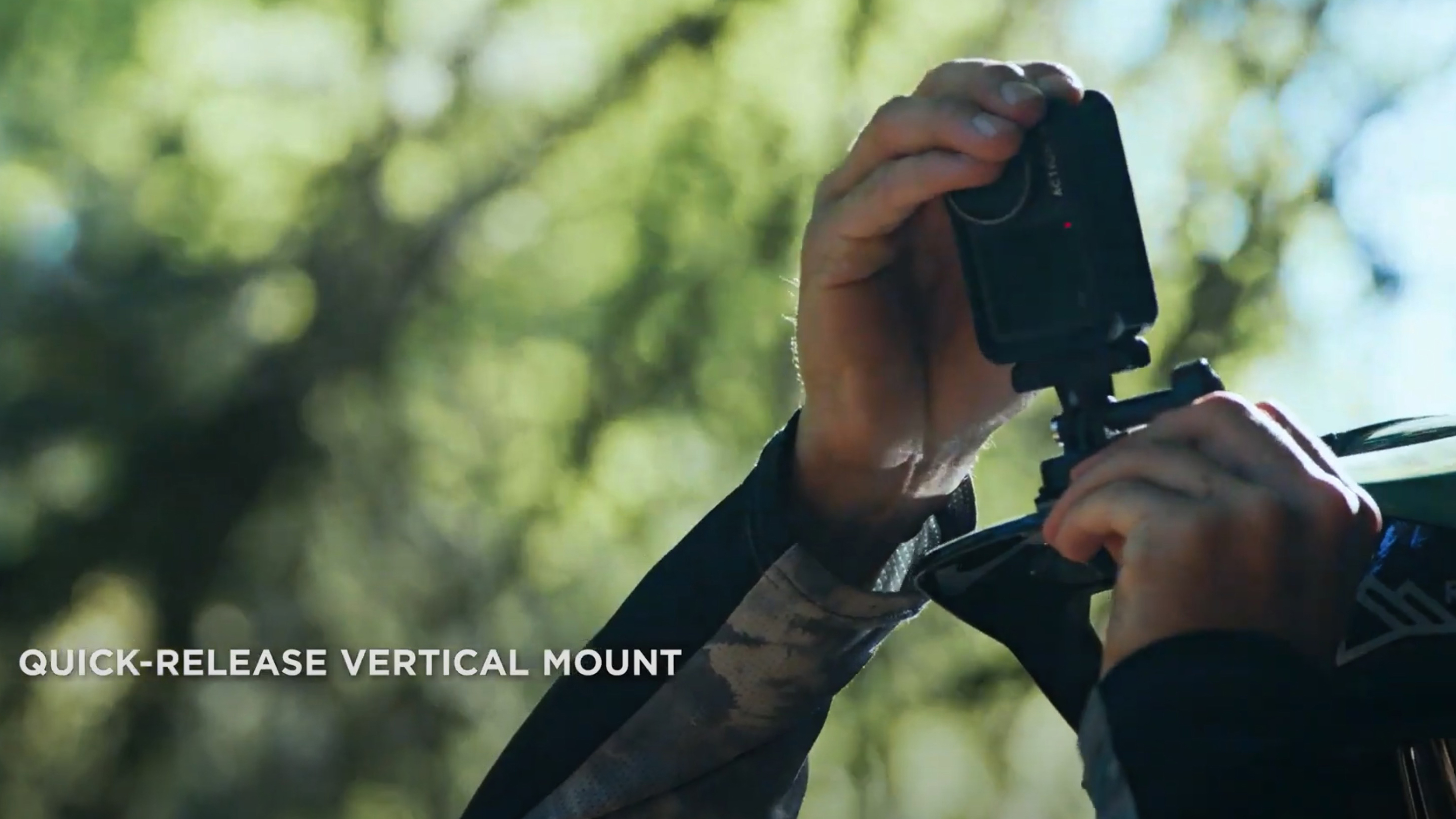 The DJI Osmo Action 3 camera being mounted on a helmet