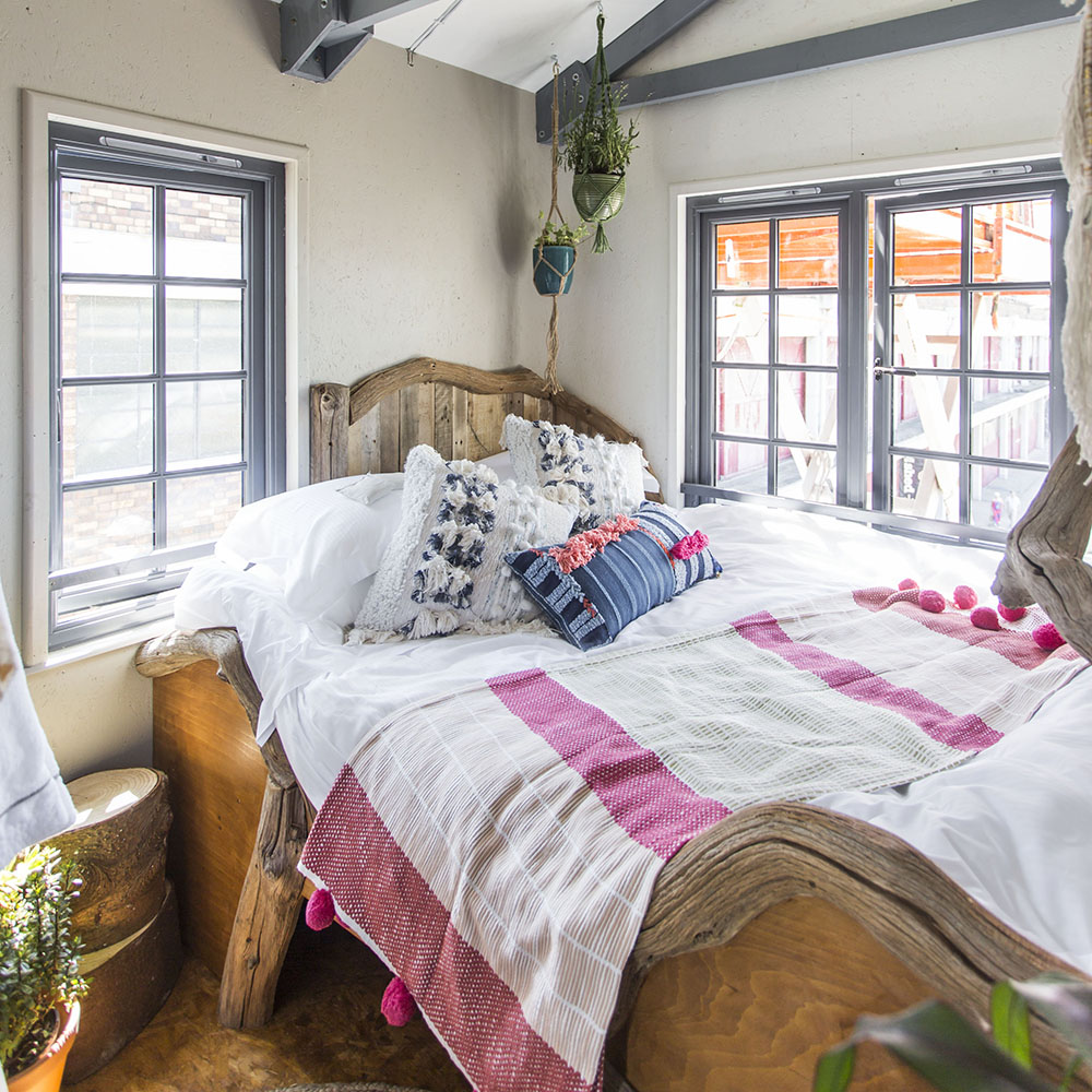 bedroom with wooden cot
