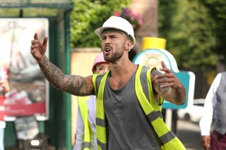 Builder Woody (Jake Quickenden) shouts at Luke to get down