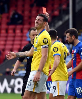 Brighton’s Lewis Dunk is dismissed against Crystal Palace