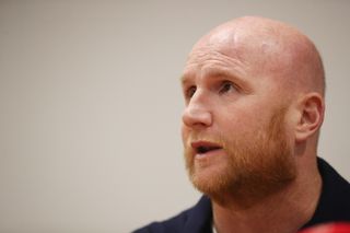Former Celtic and Wales striker John Hartson hailed the Scottish FA's stance