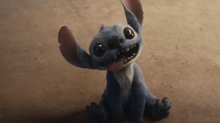 Stitch sitting on the ground in Lilo and Stitch.