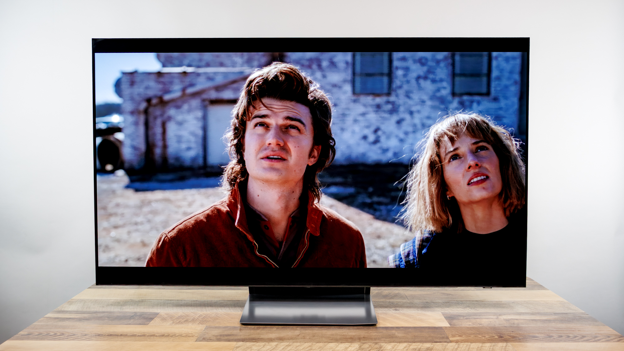 Samsung OLED S90H 4K TV on a desk