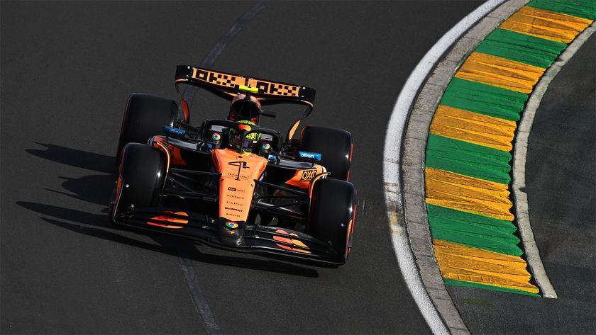 Lando Norris driving around a bend during practice for the 2025 Australian Grand Prix