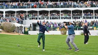 Billy Horschel throwing an American Football into the crowd at the 2024 WM Phoenix Open