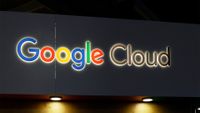Google Cloud logo and branding illuminated on a black background at Mobile World Congress 2023 in Barcelona, Spain.