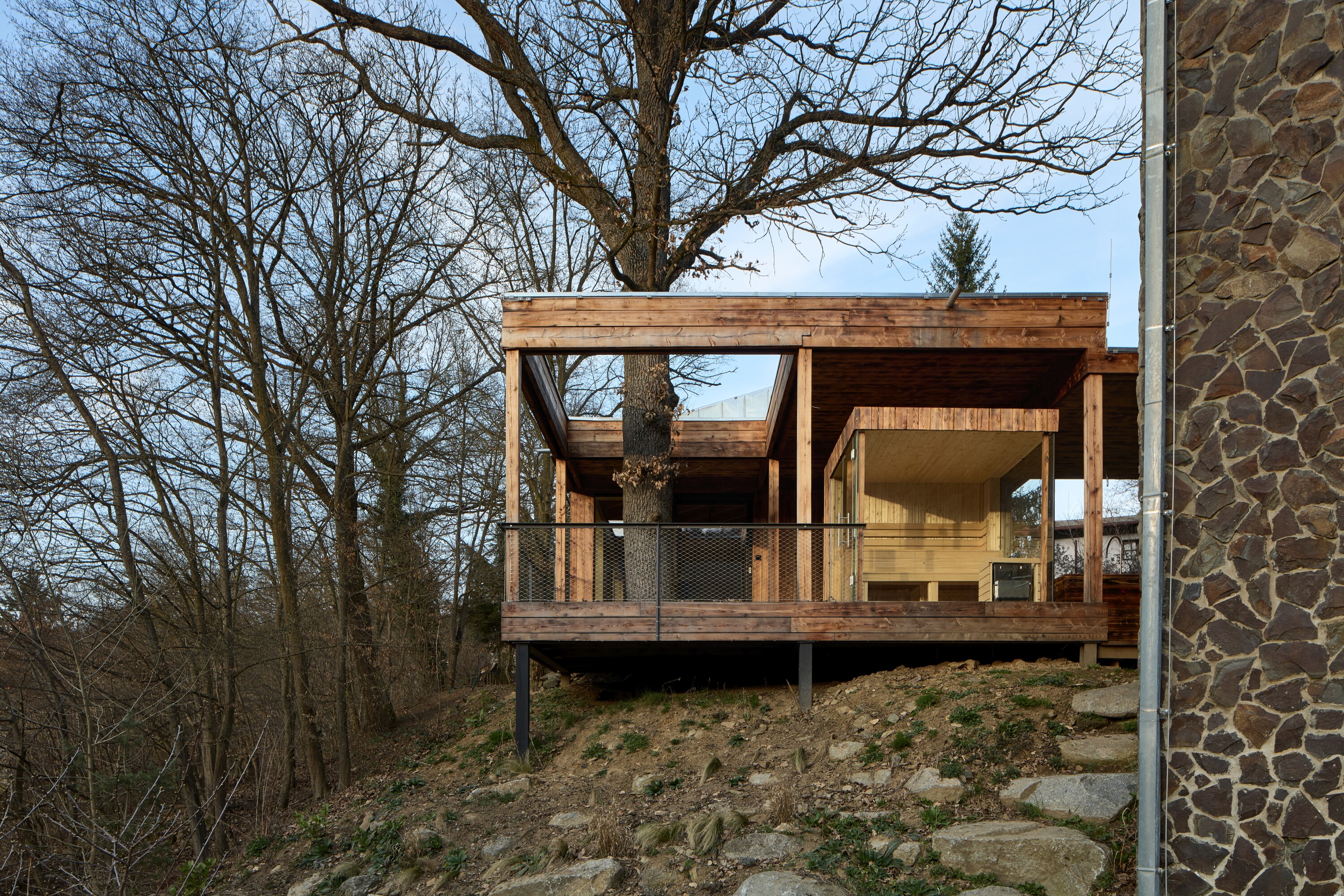 The studio is set on the edge of the sloping site