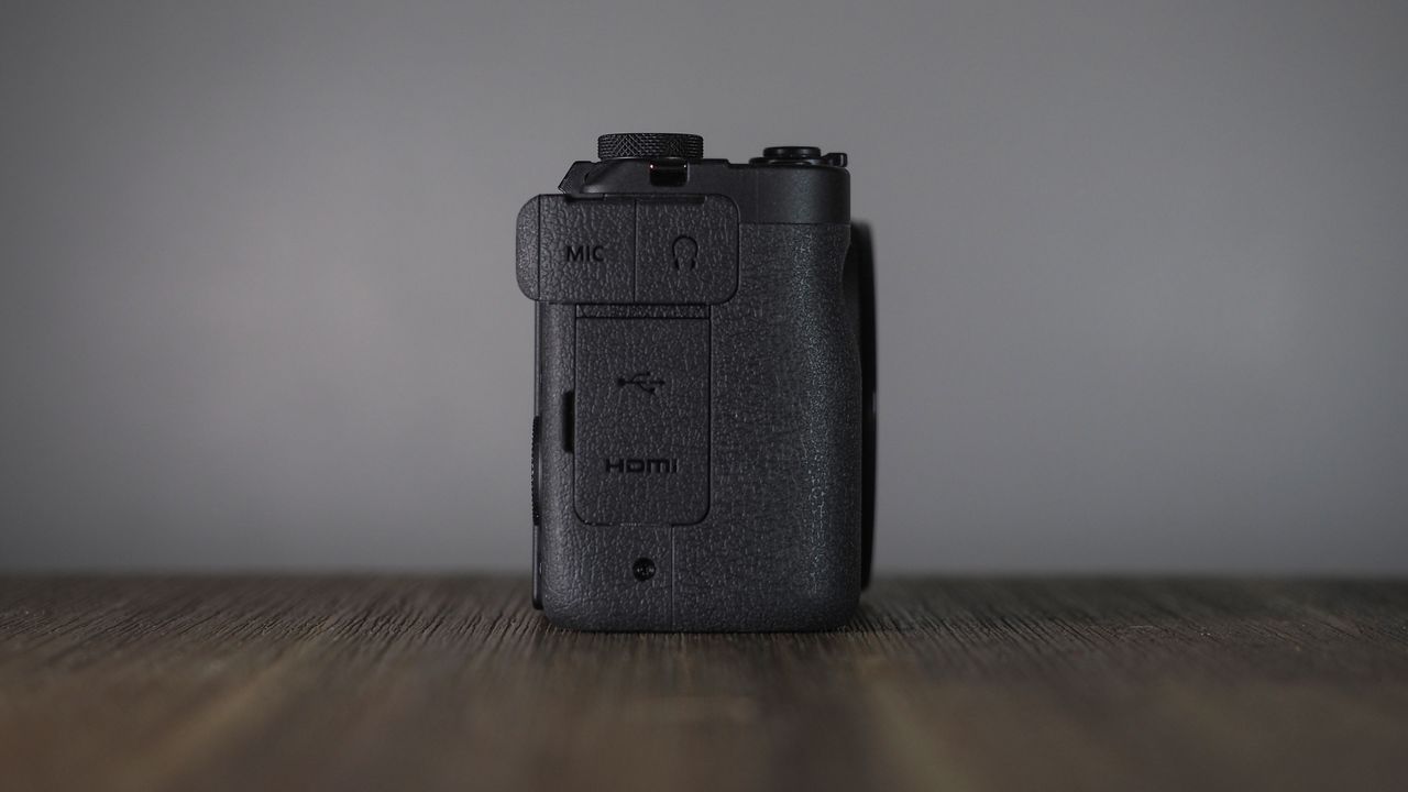 Canon PowerShot V1 on a wooden surface