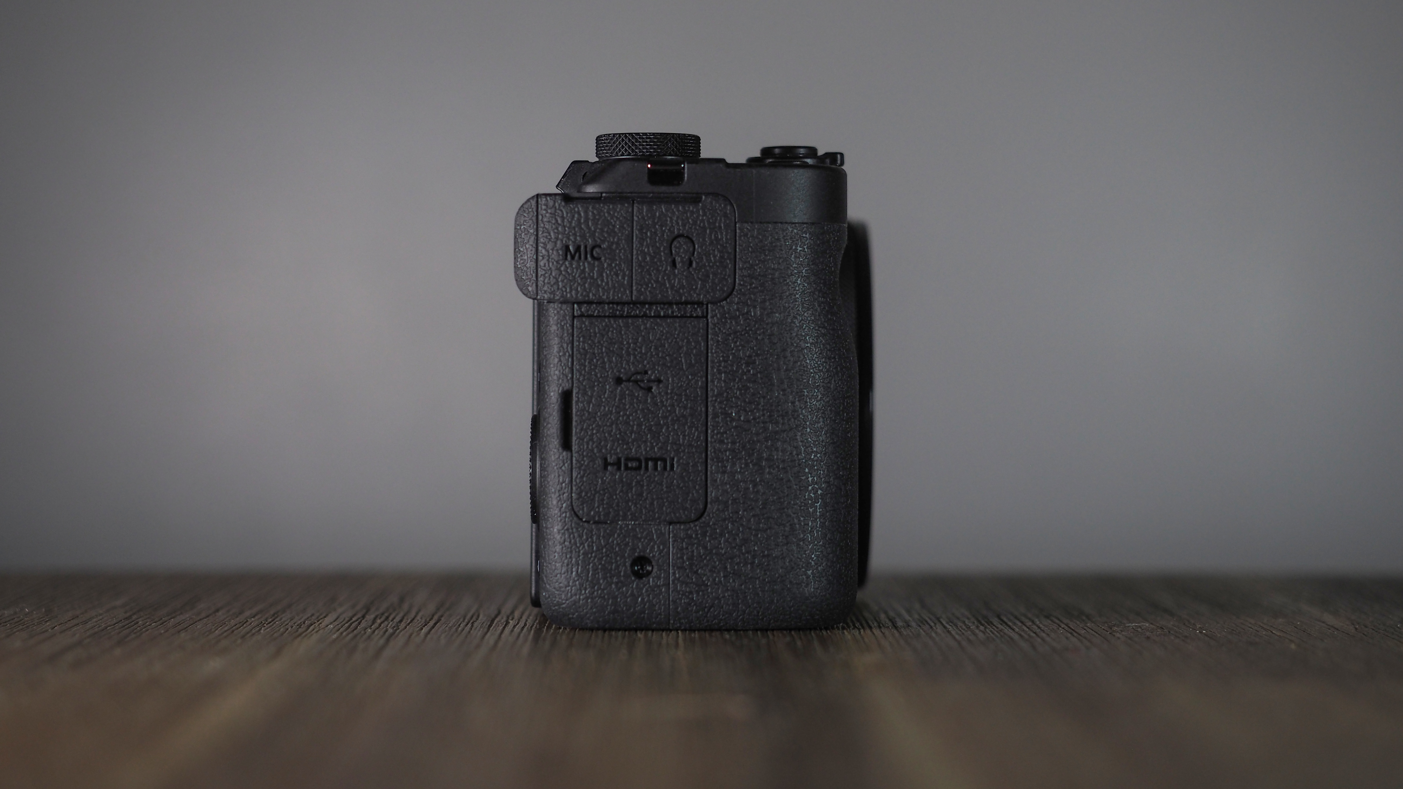 Canon PowerShot V1 on a wooden surface