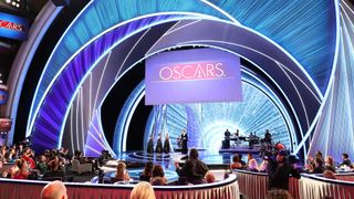 Rebe McEntire performs on stage at the Oscars
