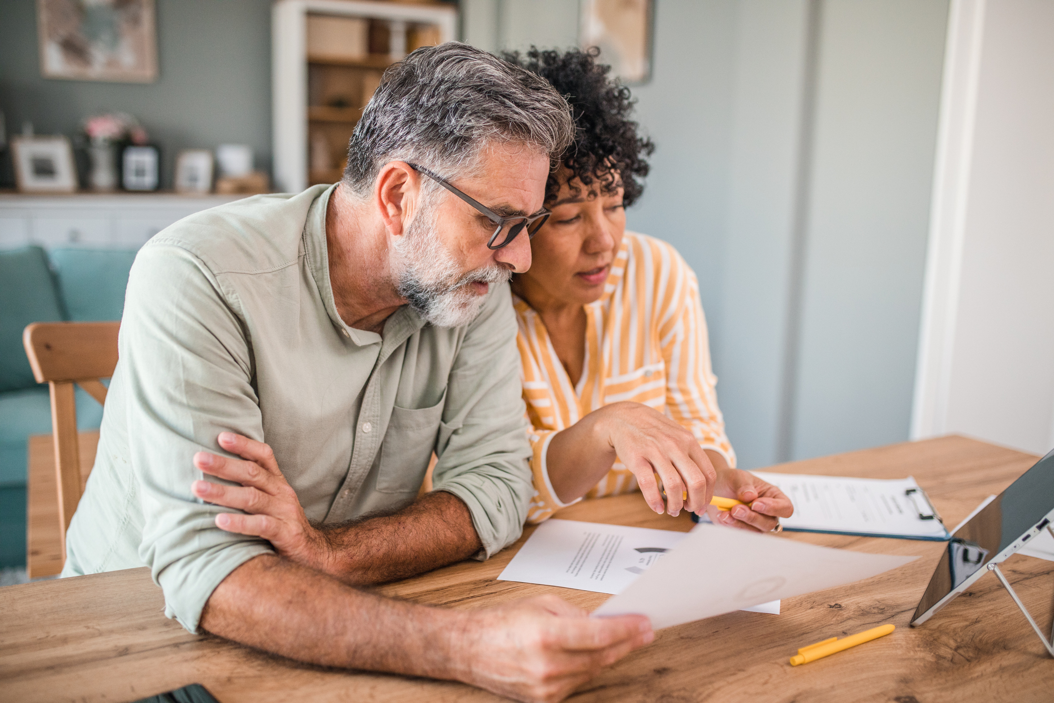 Couple looking at financial documents
