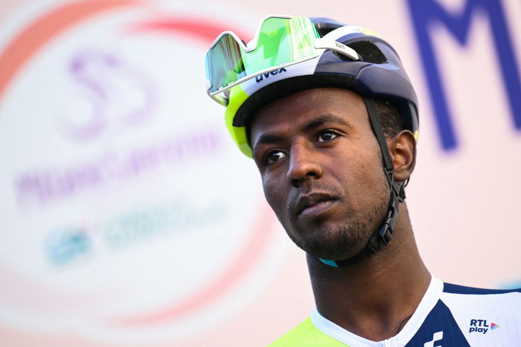 Intermarche-Wanty's Eritrean rider Biniam Girmay looks on prior to the start of the 115th Milan-SanRemo one-day classic cycling race, in Pavia, on March 16, 2024. (Photo by Marco BERTORELLO / AFP)