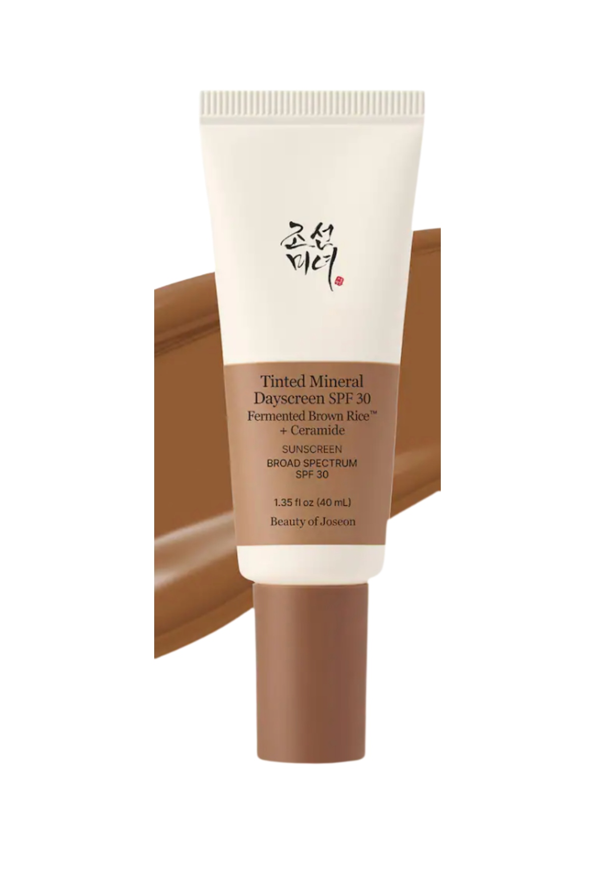 a white bottle of tinted sunscreen with a brown tint and black writing