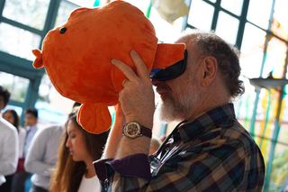 Harry Helling, executive director of Birch Aquarium at Scripps, takes a virtual dive into kelp forests off of Channel Islands National Park with the student-designed VR mask.