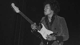 Jimi Hendrix performs live in the late 1960s