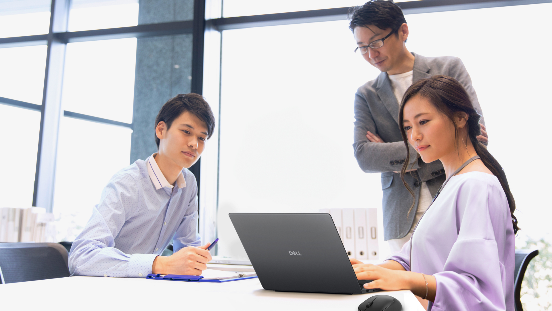 Dell Pro laptop being used in a meeting room