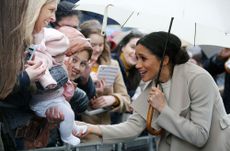 Meghan Markle and a baby in Belfast