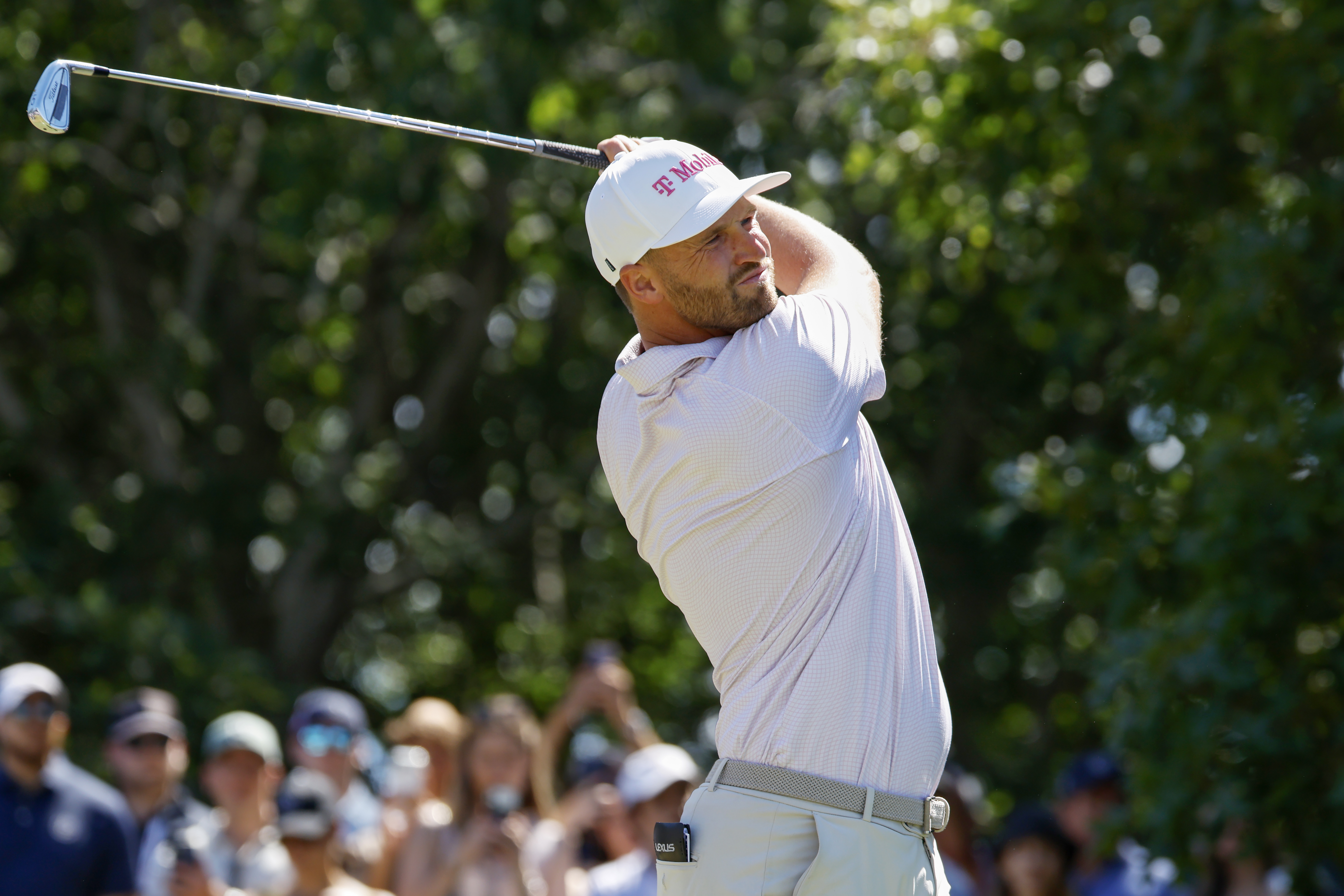 Wyndham Clark plays his shot from the second tee during the final round of the 126th US Open at Shinnecock Hills Golf Club