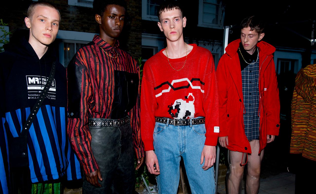 Martine Rose S/S 2019 - Models are seen wearing bright striped shirts and skirts