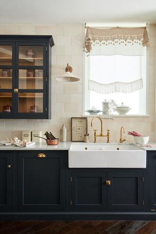 navy kitchen with butler sink