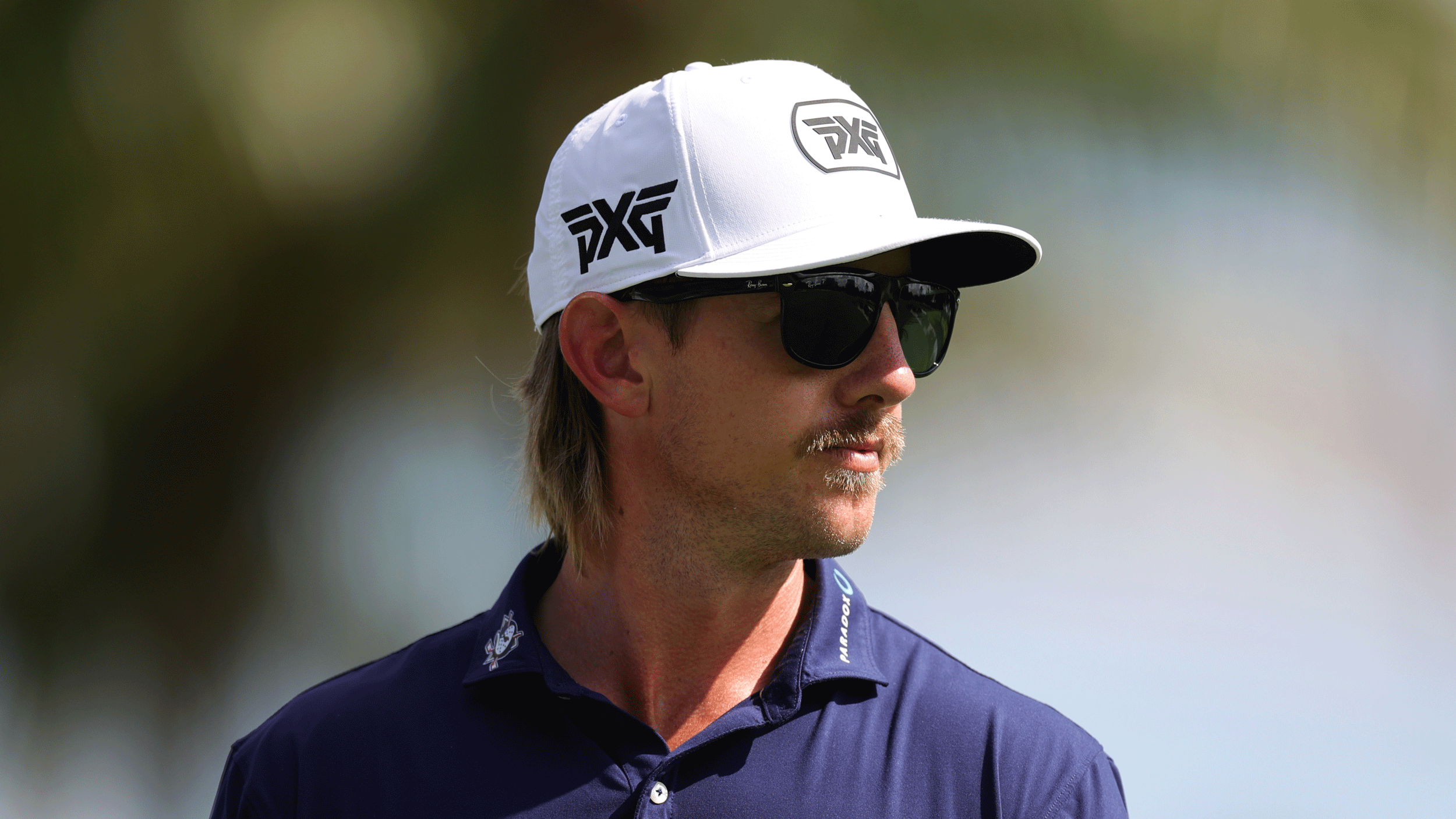 Jake Knapp looks on through dark sunglasses ahead of the 2026 Cadillac Championship