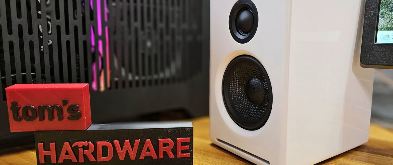 Side angle view of A2+ speaker with Tom's Hardware logo.