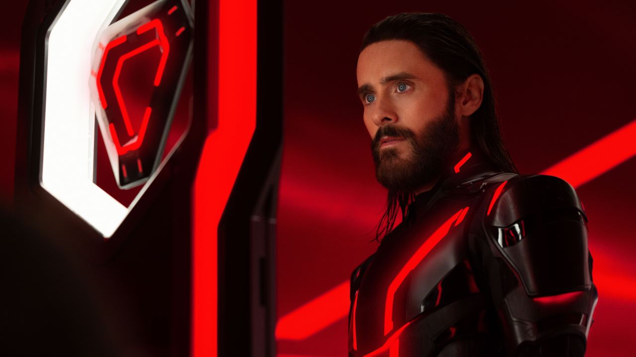 Jared Leto stares at his ID Disc cryptically in Tron: Ares.