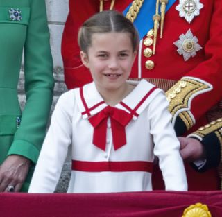 Princess Charlotte in a red and white sailor inspired dress at Trooping the Colour