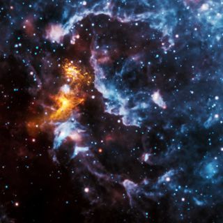 This cloud shows young stars being born amid the gas and dust. The image was taken in 2010 by NASA's Wide-field Infrared Survey Explorer (WISE).