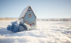 The Nationwide House Price Index symbolised by a frozen tiny house