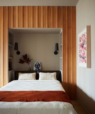 calming modern bedroom with neutral color scheme, cream bedding and earthy accents