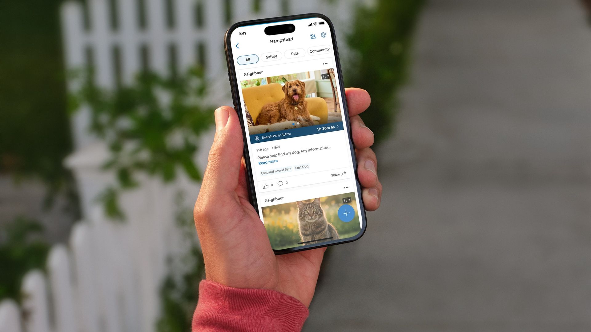 Person holding phone showing Ring Neighbours app