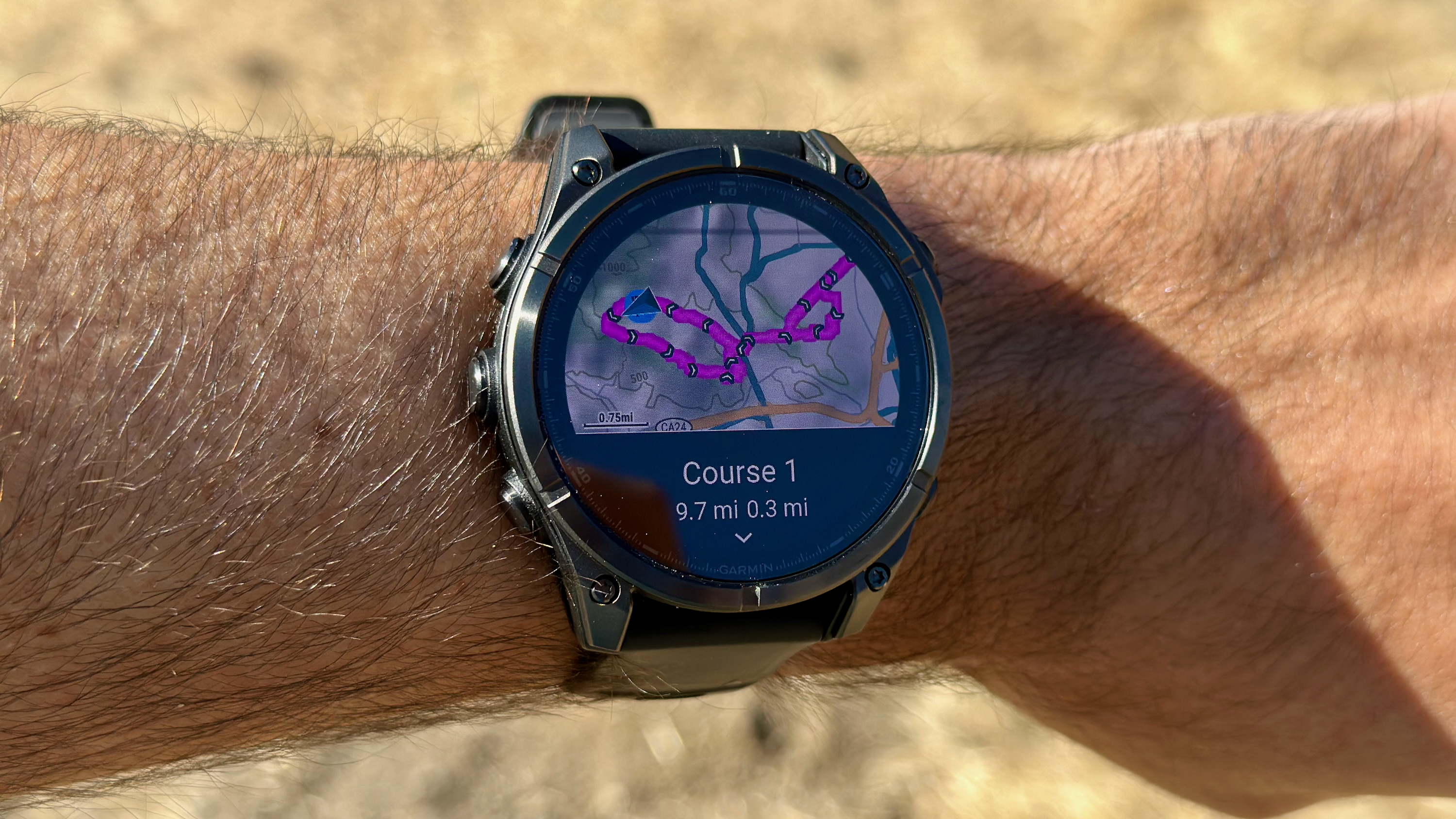 The Garmin Fenix 8 showing a 9.7-mile auto-generated course from where the user is standing.