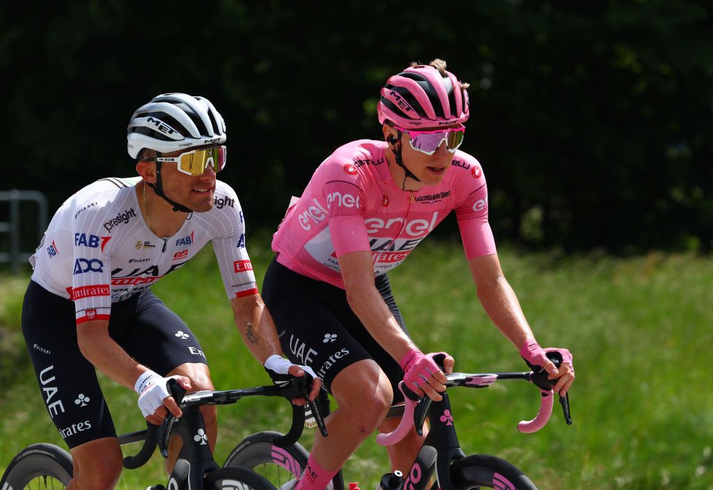 Team UAE's Slovenian rider Tadej Pogacar and Team UAE's Polish rider Rafal Majka rides during the 19th stage of the 107th Giro d'Italia cycling race, 157km between Mortegliano and Sappada on May 24, 2024. (Photo by Luca Bettini / AFP)