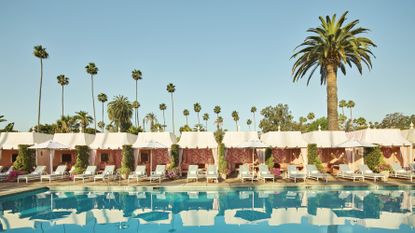 The Beverly Hills Hotel poolside with swimming pool and palm trees