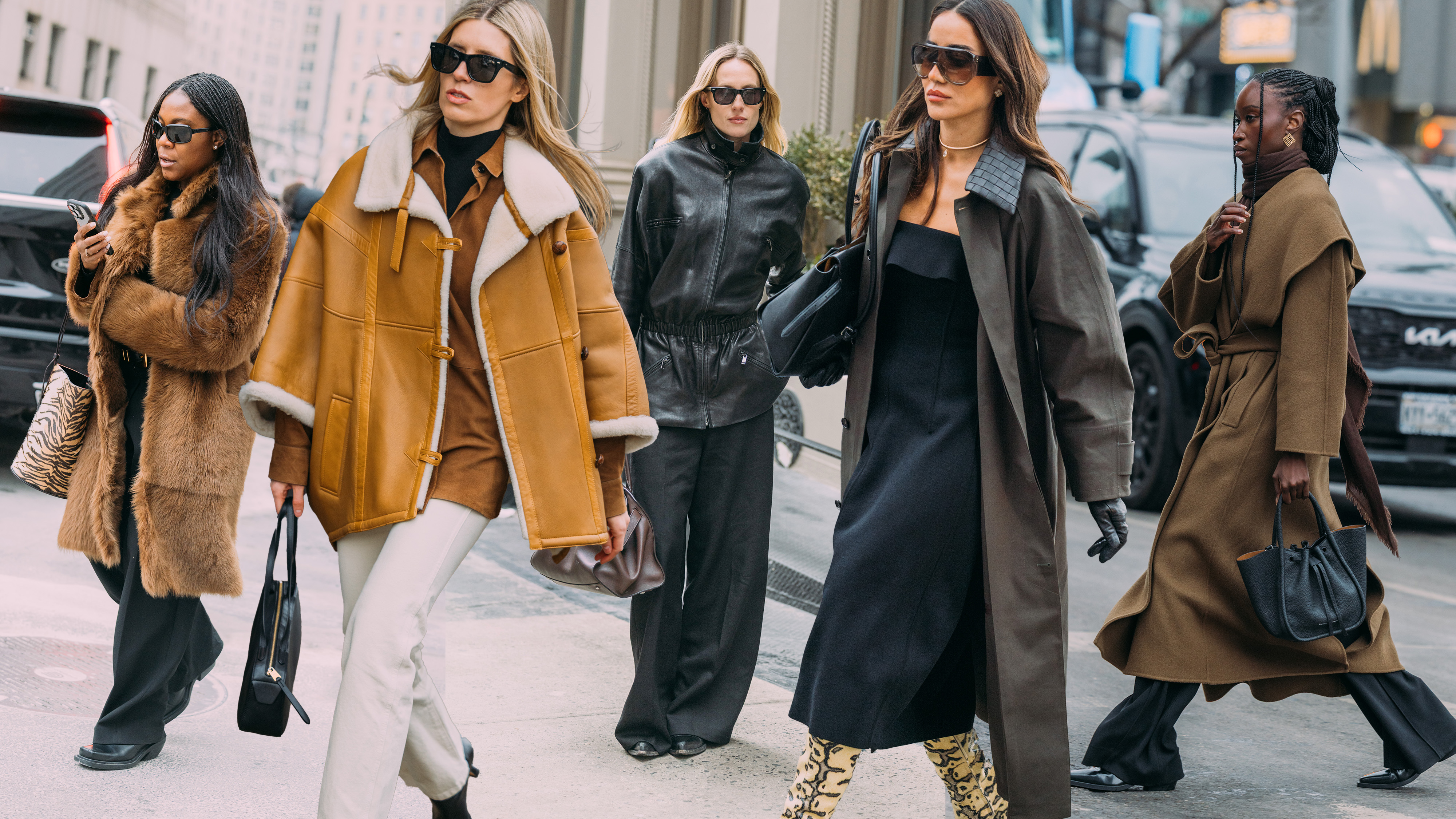 Women during fashion week in new york wearing different fall/winter 2026 trends.